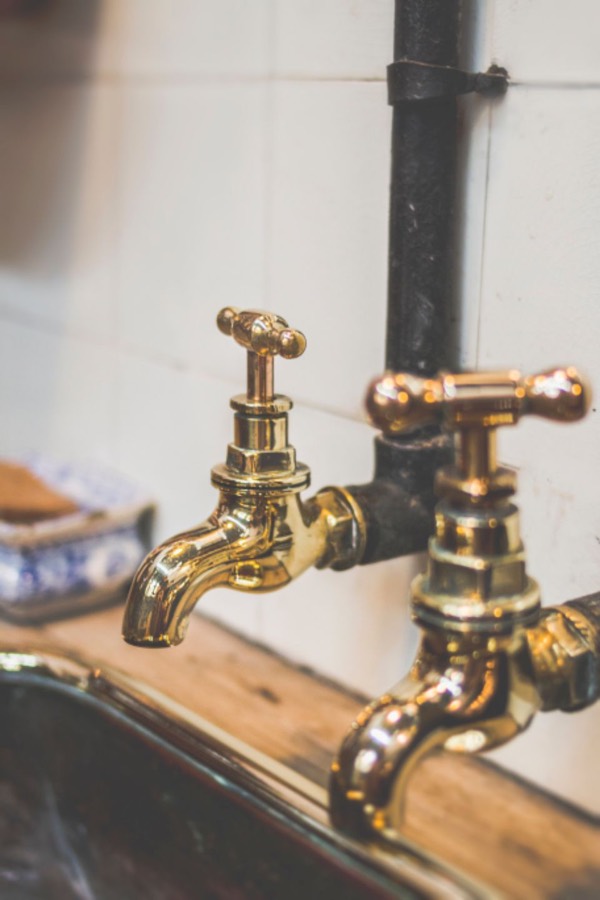 Brass taps over a sink